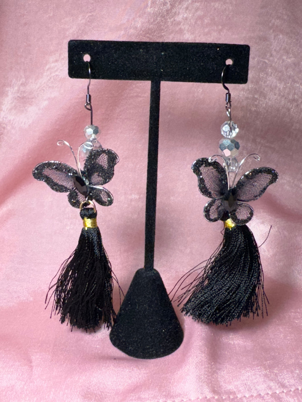 Black butterflies dangle